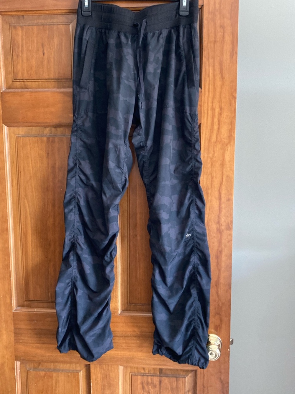 ALO Yoga Black camo Athletic Pants with White Logo and ruched legs